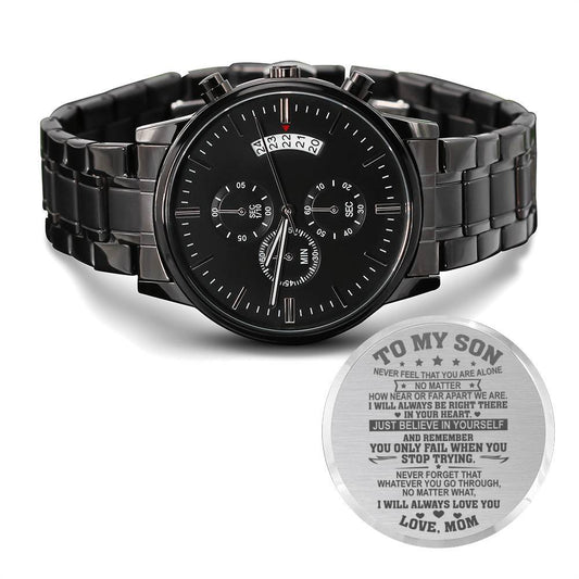 Black wristwatch with a motivational message card on a white background